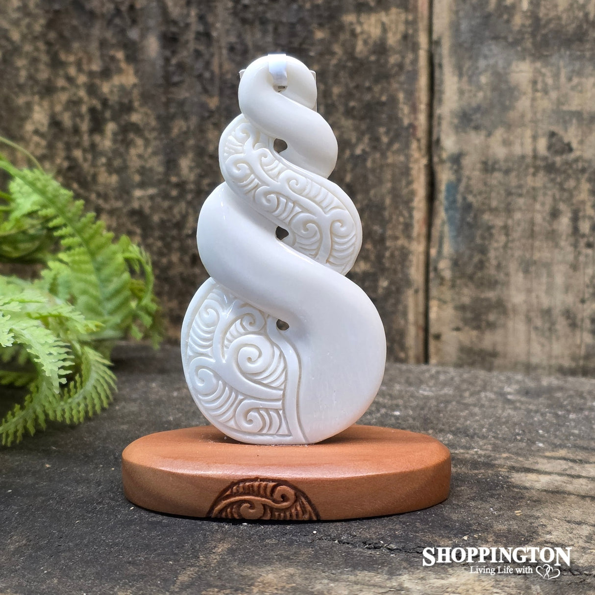 Bone Carved Twist on Wooden Stand