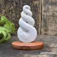 Bone Carved Twist on Wooden Stand