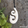 Bone Carving with Whale Tail Carved Detail