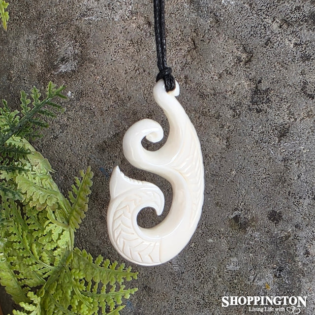 Bone Carving with Whale Tail Carved Detail
