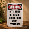 Tin Novelty Sign - WARNING Sense of Humor